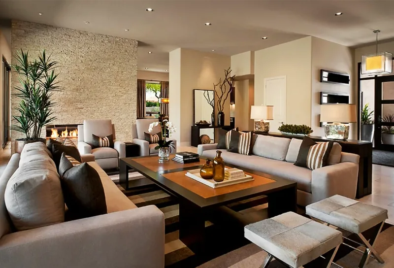 Furnished living room with gallery wall and plants